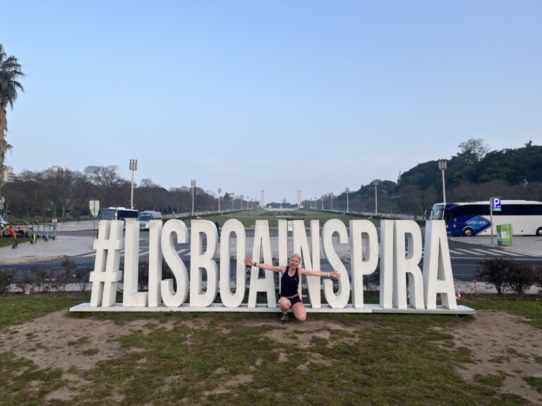 Lisbon, Lisbon sign, Runner, Running, Woman next to Lisbon sign