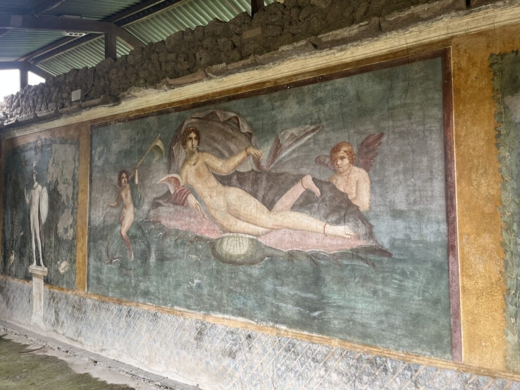 Pompeii, Italy, Tourist attraction, Pompeii artwork, A large painting of a naked woman lying in a shell surrounded by naked nymphs