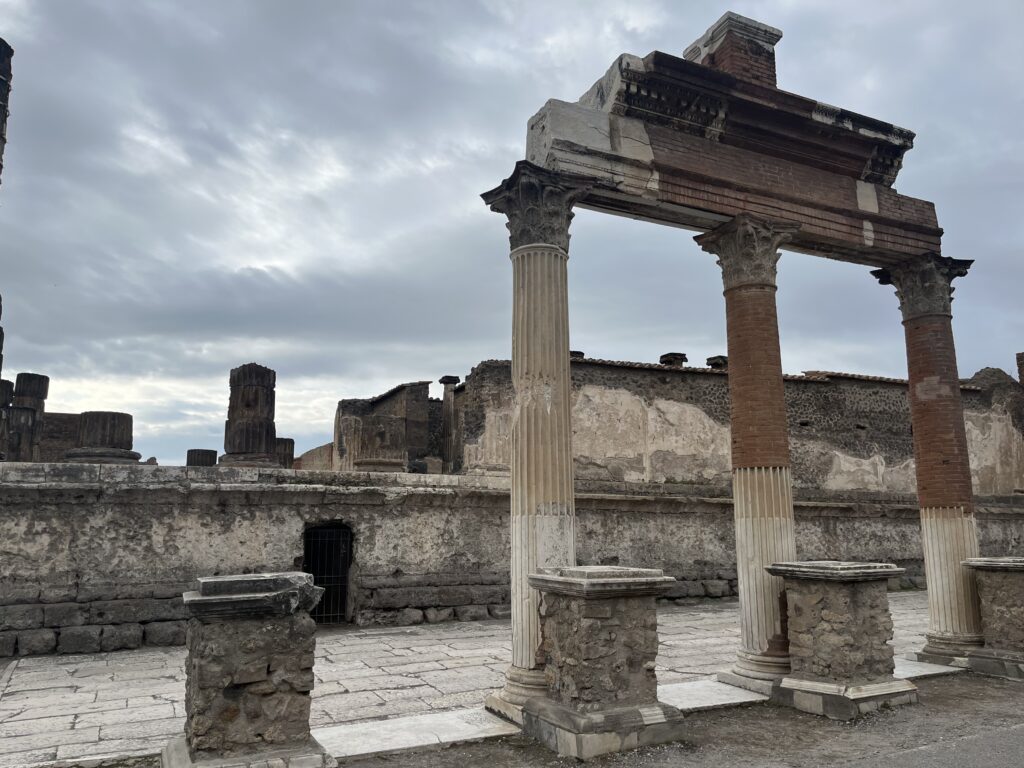 Pompeii, Italy, Tourist attraction, Silent Sunday, My Sunday Photo, Tall ruined columns in front of ruined walls and a grey cloudy sky