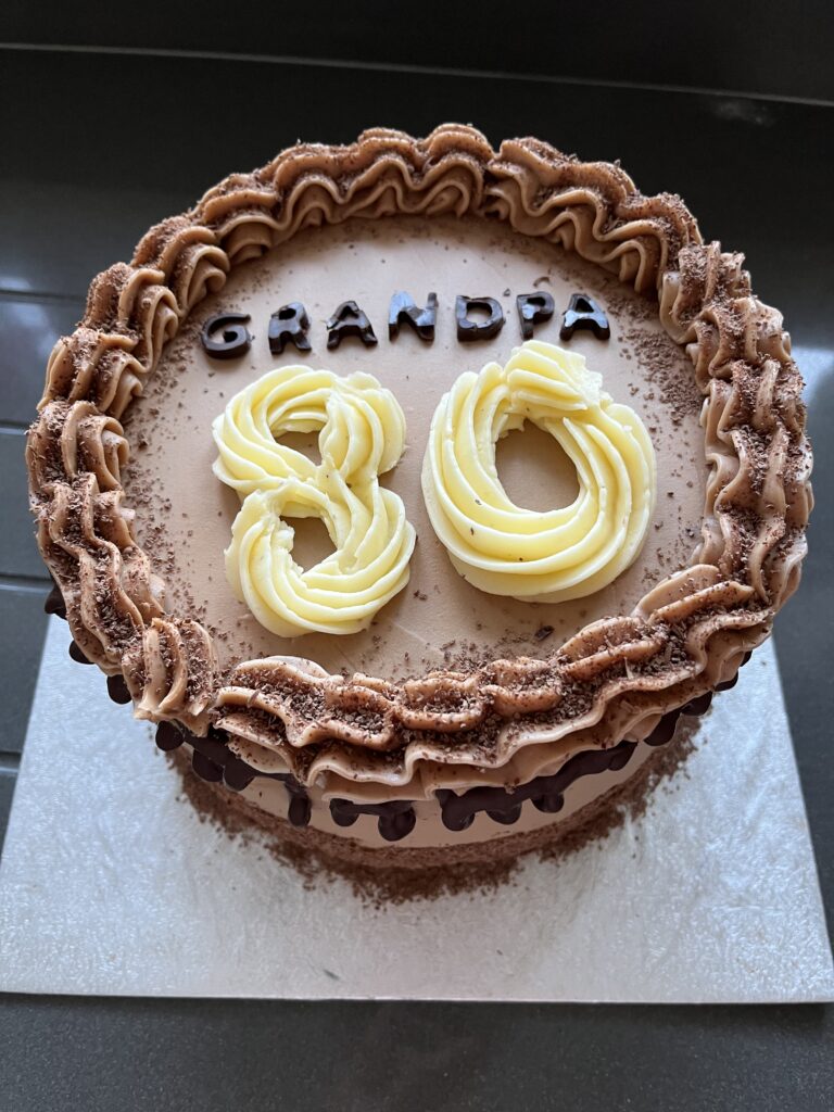 Birthday, 80th birthday, Birthday cake, Baking, Home baking, Silent Sunday, My Sunday Photo, A chocolate birthday cake with piped chocolate buttercream round the edge and a big 80 in white piped buttercream and Grandpa in chocolate letters