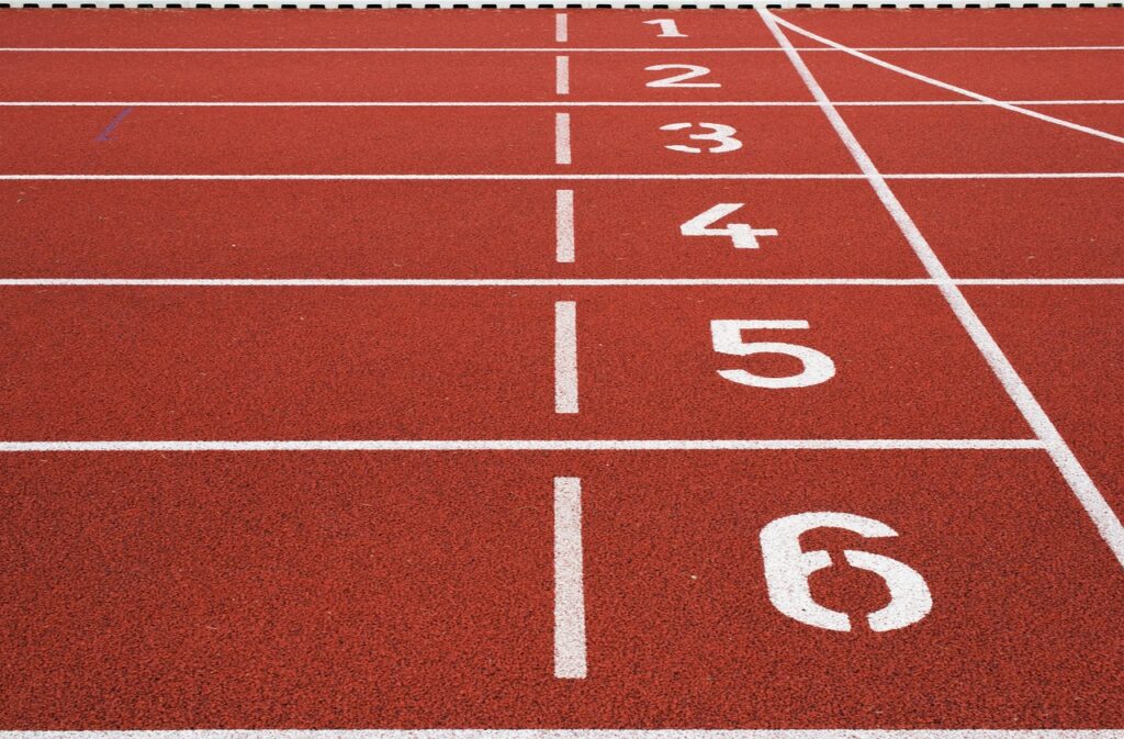 Running track, Start line, Running, A red running track start line with numbered lanes 1 to 6