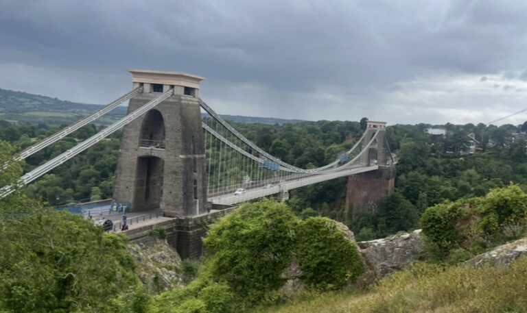 Clifton Suspension Bridge, Bridge, Bristol, Silent Sunday, My Sunday Photo, An old brick suspension bridge stretches across a gorge covered in trees with cars just visible going across it