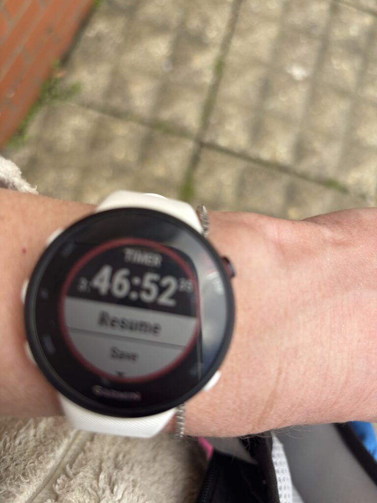 Newport marathon, Finish time, Close-up of a digital watch on a woman's wrist which says